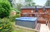 log cabin lake district hot tub