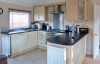wansfell view log cabin kitchen